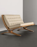 Romantic Minimalist Loveseat – Curved Leather Cushions with Wooden Cantilever Frame